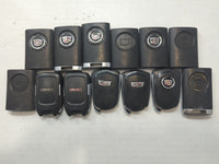 Lot of 13 Cadillac Keyless Entry Remote Fob MIXED FCC IDS MIXED PART - Oemusedautoparts1.com