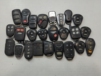 compare product Lot of 25 Aftermarket Keyless Entry Remote Fob MIXED FCC IDS MIXED PART