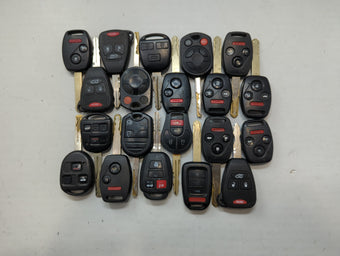 compare product Lot of 20 Aftermarket Keyless Entry Remote Fob MIXED FCC IDS MIXED PART
