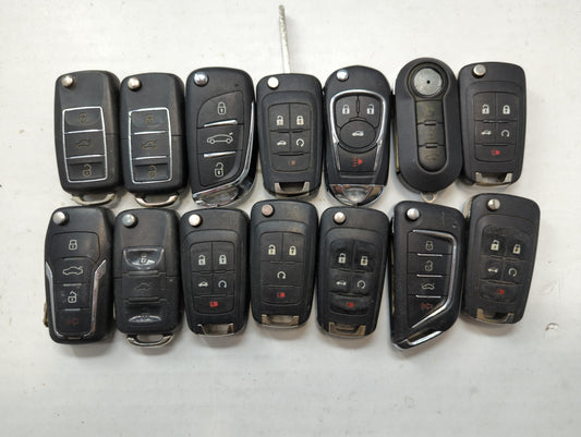 Lot of 14 Aftermarket Keyless Entry Remote Fob MIXED FCC IDS MIXED PART - Oemusedautoparts1.com