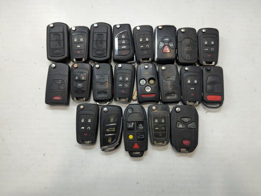 Lot of 23 Aftermarket Keyless Entry Remote Fob MIXED FCC IDS MIXED PART - Oemusedautoparts1.com