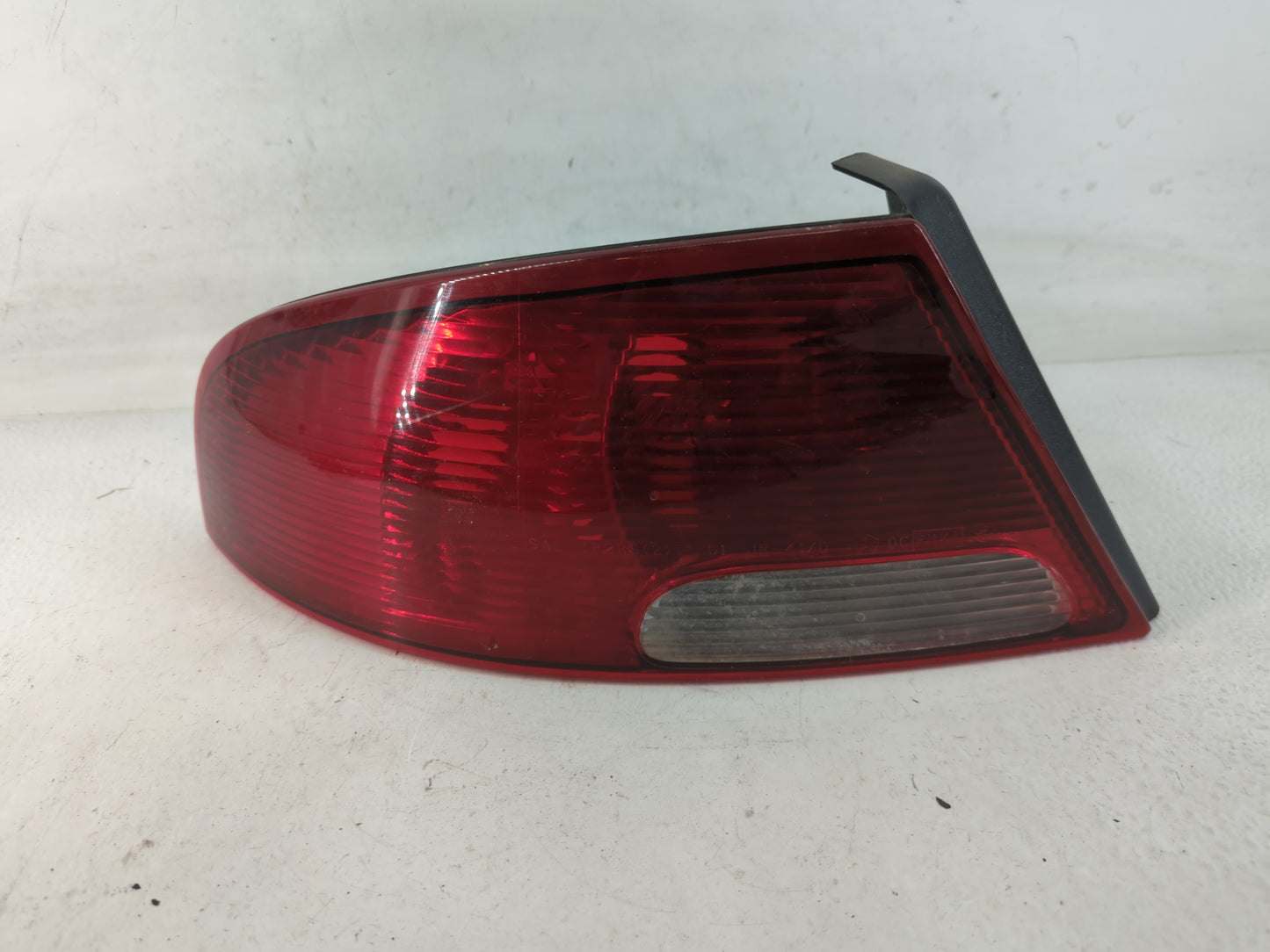 2001-2006 Dodge Stratus Tail Light Assembly Driver Left OEM P/N:58622E 04805351AA Fits Fits 2001 2002 2003 2004 2005 2006 OEM Used Auto Parts - Oemusedautoparts1.com