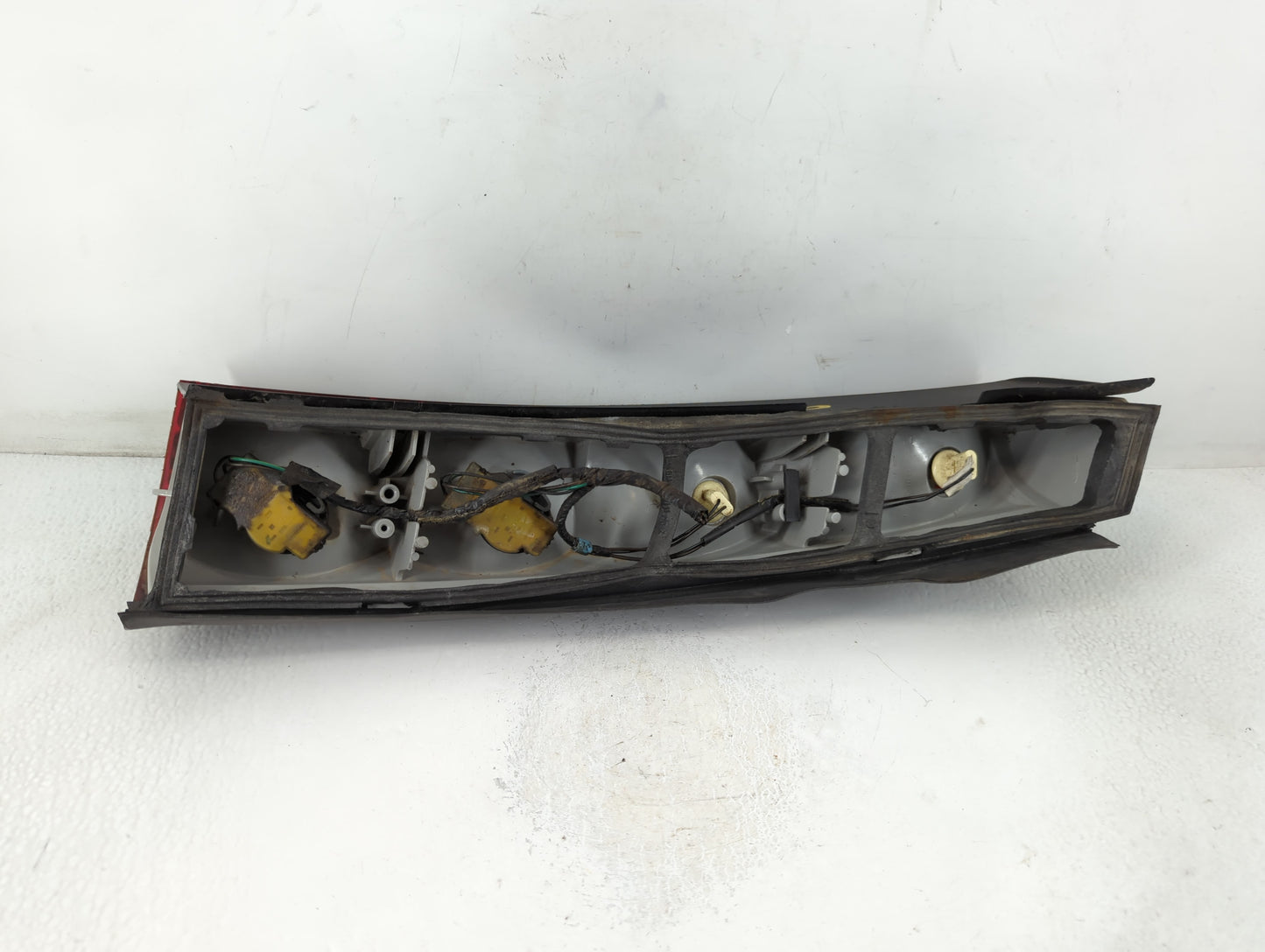 1990-1996 Pontiac Trans Sport Tail Light Assembly Driver Left OEM P/N:16511103 Fits Fits 1990 1991 1992 1993 1994 1995 1996 OEM Used Auto Parts - Oemusedautoparts1.com