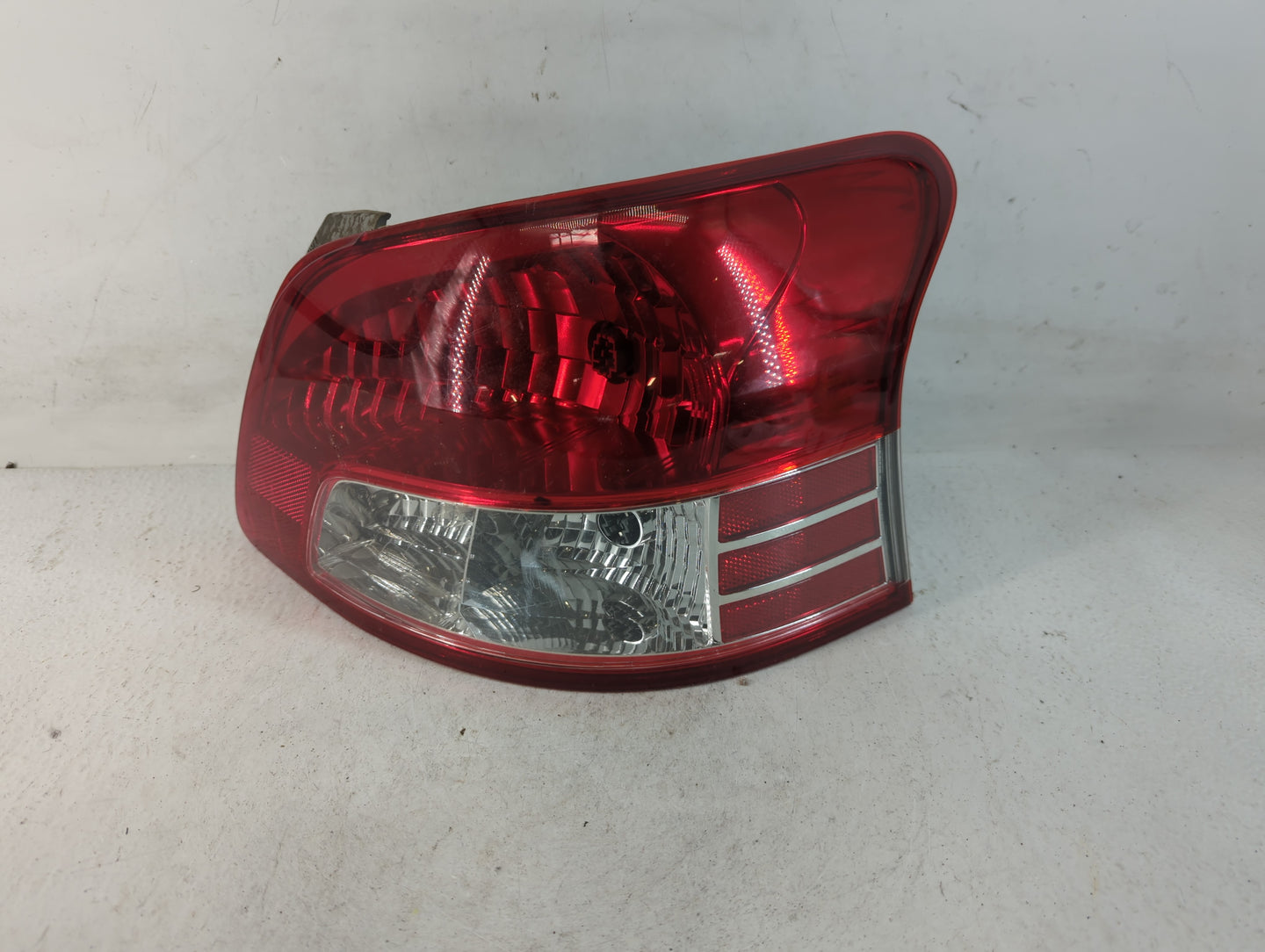 2007-2012 Toyota Yaris Tail Light Assembly Driver Left OEM Fits Fits 2007 2008 2009 2010 2011 2012 OEM Used Auto Parts - Oemusedautoparts1.com