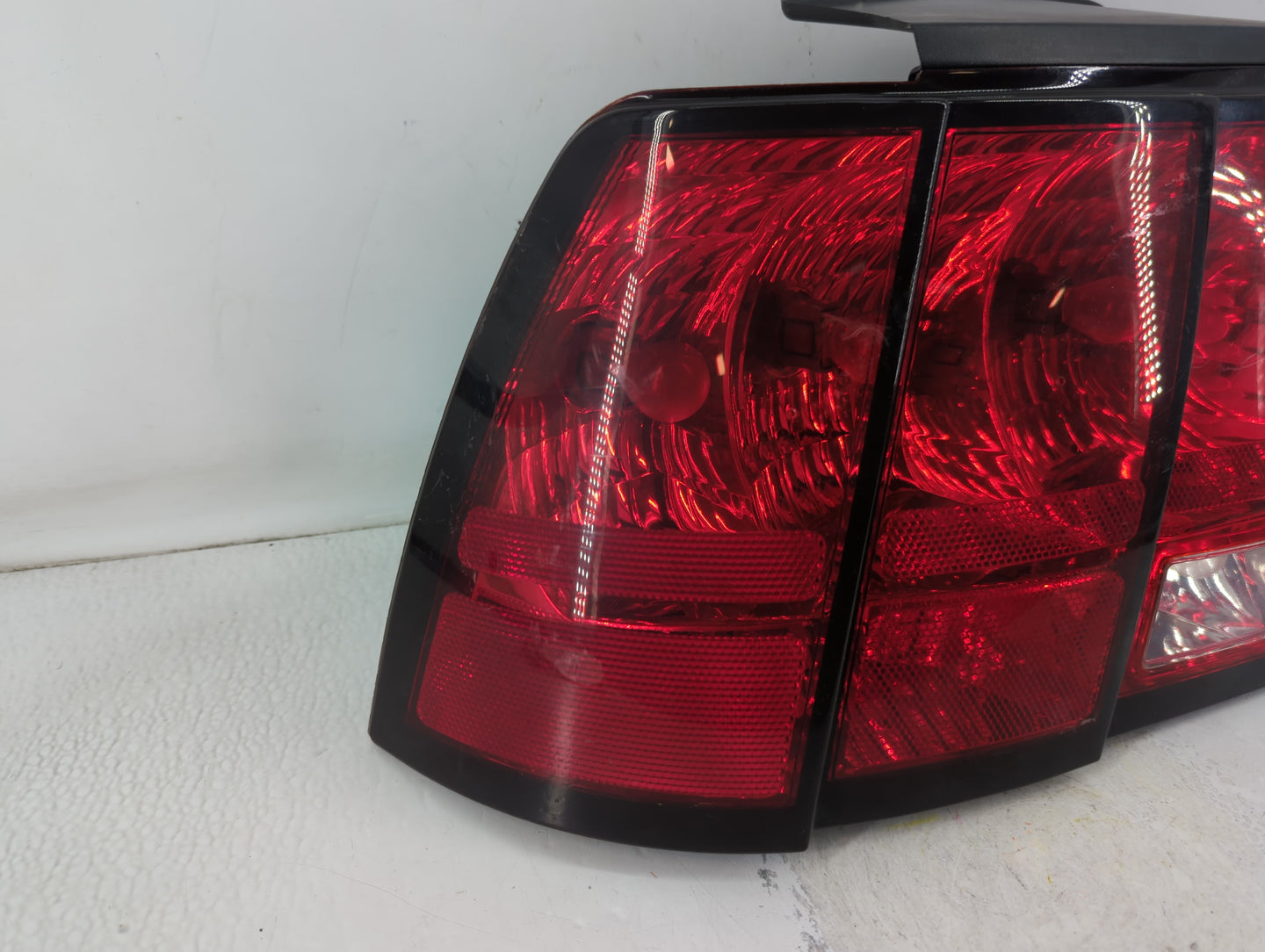 1999-2004 Ford Mustang Tail Light Assembly Driver Left OEM P/N:13411-AA 02299051D Fits Fits 1999 2000 2001 2002 2003 2004 OEM Used Auto Parts - Oemusedautoparts1.com