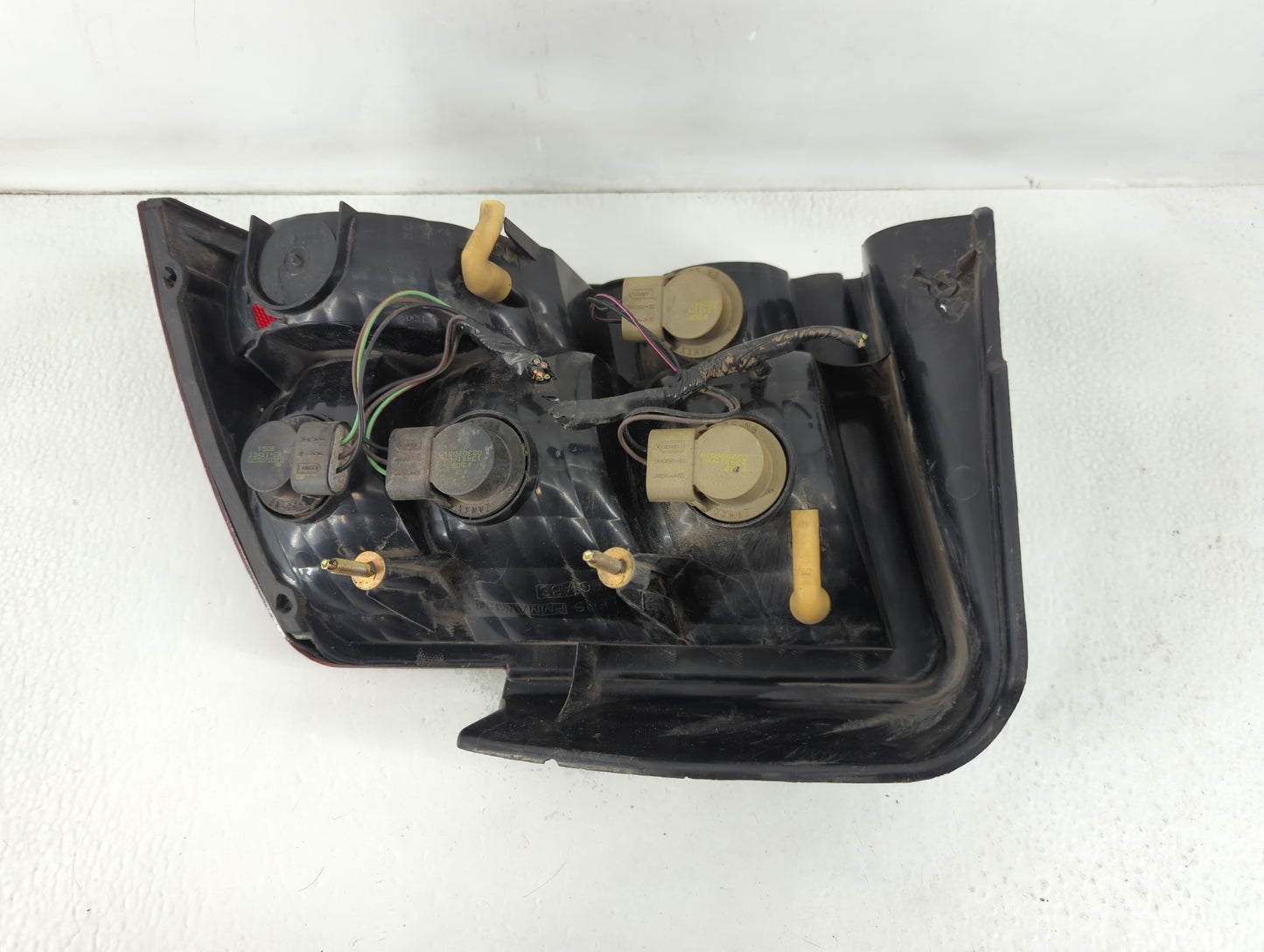 1999-2004 Ford Mustang Tail Light Assembly Driver Left OEM P/N:13411-AA 02299051D Fits Fits 1999 2000 2001 2002 2003 2004 OEM Used Auto Parts - Oemusedautoparts1.com