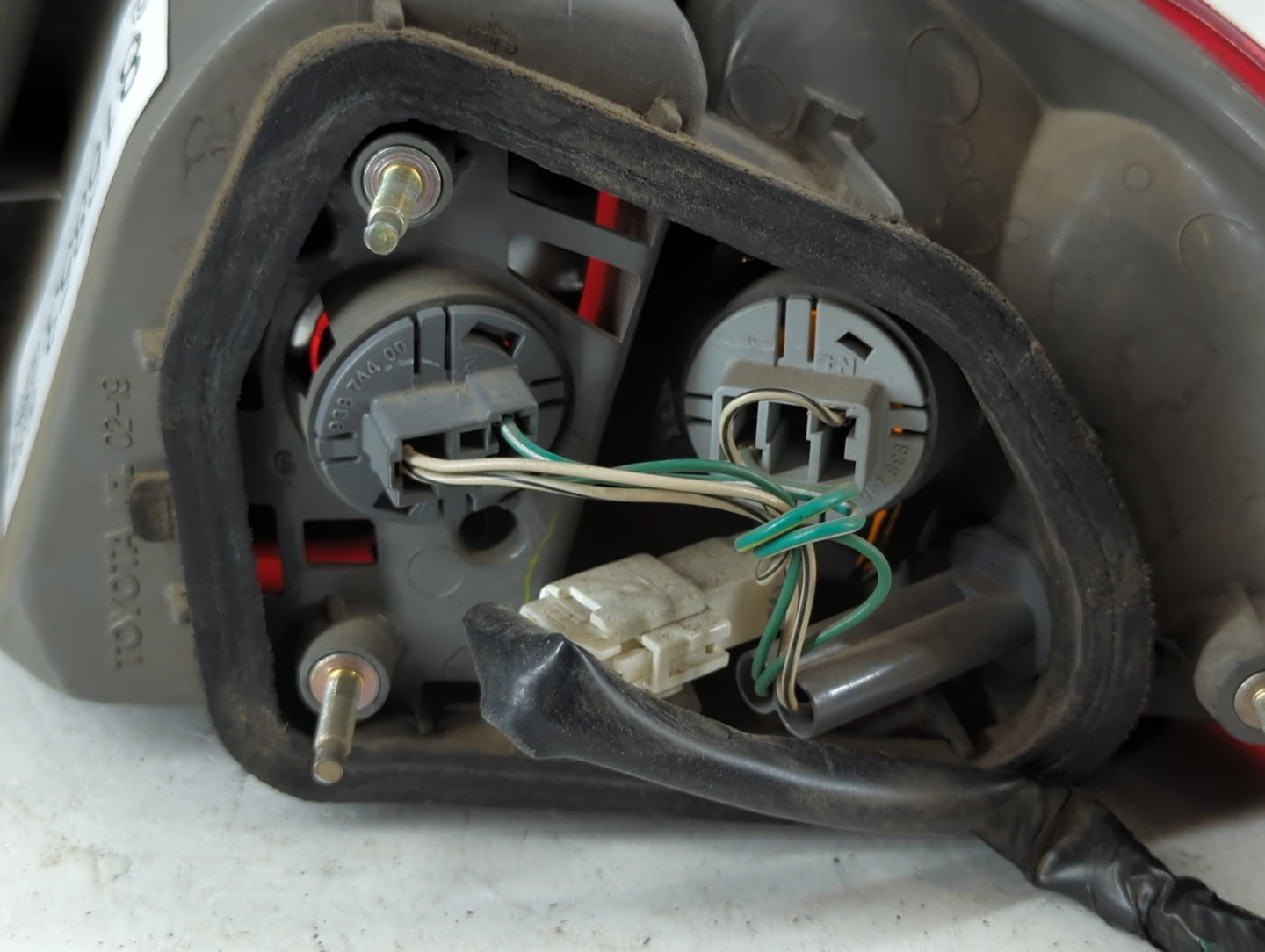 2001-2002 Toyota Corolla Tail Light Assembly Driver Left OEM Fits Fits 2001 2002 OEM Used Auto Parts - Oemusedautoparts1.com