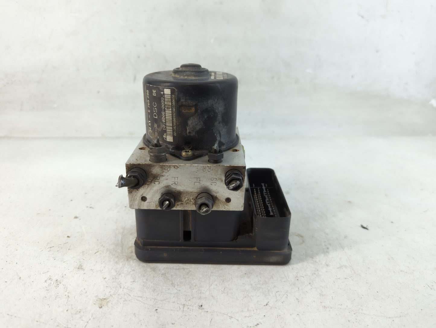 2004 Mini Cooper ABS Pump Control Module Replacement P/N:6 765 286 Fits OEM Used Auto Parts - Oemusedautoparts1.com