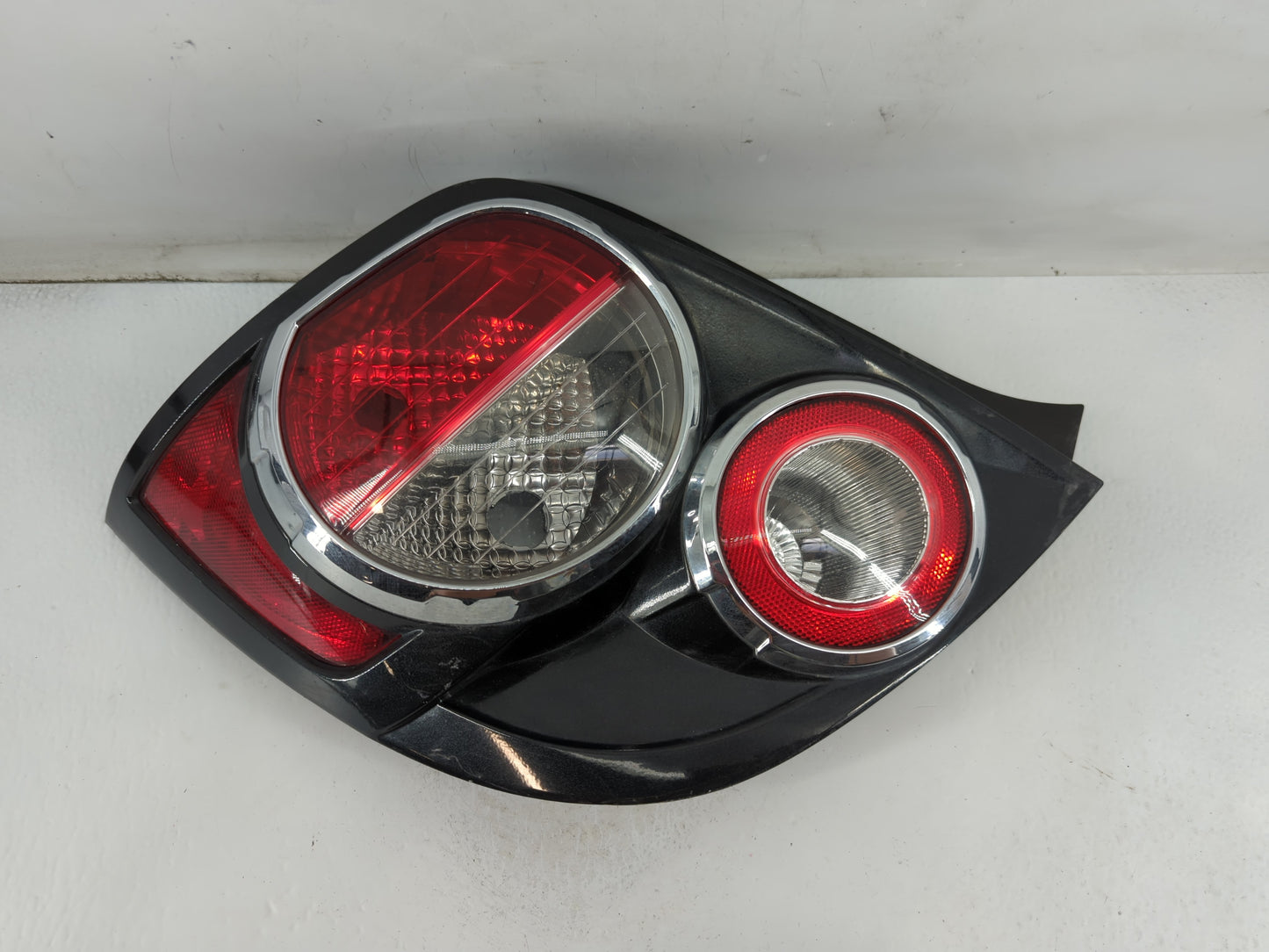 2012-2016 Chevrolet Sonic Tail Light Assembly Driver Left OEM P/N:95470356 Fits Fits 2012 2013 2014 2015 2016 OEM Used Auto Parts - Oemusedautoparts1.com