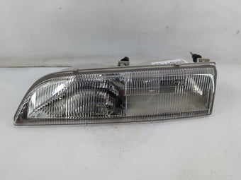 compare product 1990 Ford Thunderbird Driver Left Oem Head Light Headlight Lamp