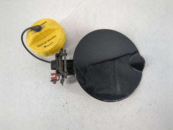 compare product 2014 Chrysler Town & Country Fuel Tank Door Lid Gas Tank Black