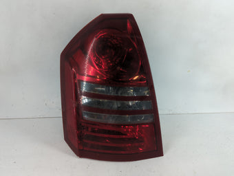 compare product 2005-2007 Chrysler 300 Tail Light Assembly Driver Left OEM P/N:04805853AC Fits Fits 2005 2006 2007 OEM Used Auto Parts