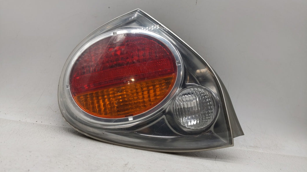 2002-2003 Nissan Maxima Tail Light Assembly Driver Left OEM Fits 2002 2003 OEM Used Auto Parts - Oemusedautoparts1.com