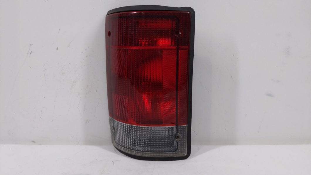 2005-2014 Ford E-150 Tail Light Assembly Driver Left OEM P/N:F7UB 13441 A1 Fits 2005 2006 2007 2008 2009 2010 2011 2012 2013 2014 OEM Used Auto Parts - Oemusedautoparts1.com