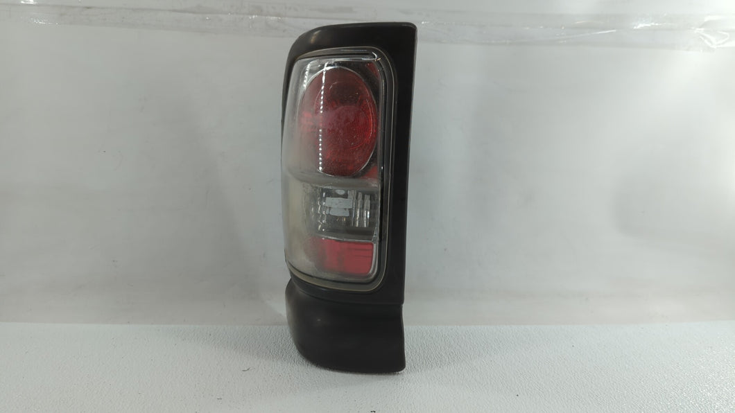 1994-2001 Dodge Ram 1500 Tail Light Assembly Driver Left OEM Fits 1994 1995 1996 1997 1998 1999 2000 2001 2002 OEM Used Auto Parts - Oemusedautoparts1.com