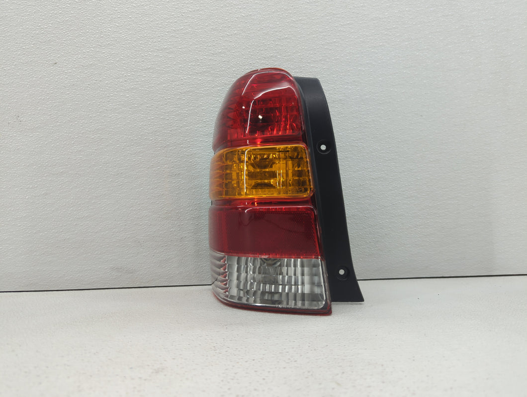 2001-2007 Ford Escape Tail Light Assembly Driver Left OEM P/N:1L84-13B505-D Fits 2001 2002 2003 2004 2005 2006 2007 OEM Used Auto Parts