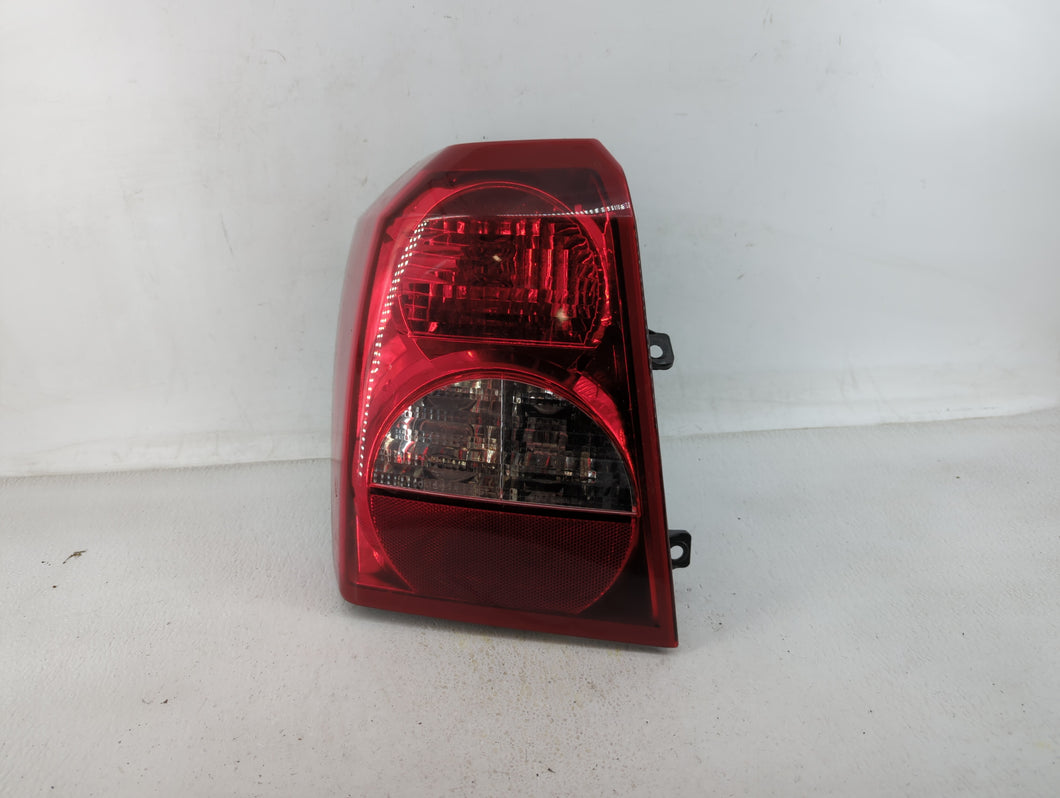 2008-2012 Dodge Caliber Tail Light Assembly Driver Left OEM P/N:05160361AA Fits 2008 2009 2010 2011 2012 OEM Used Auto Parts