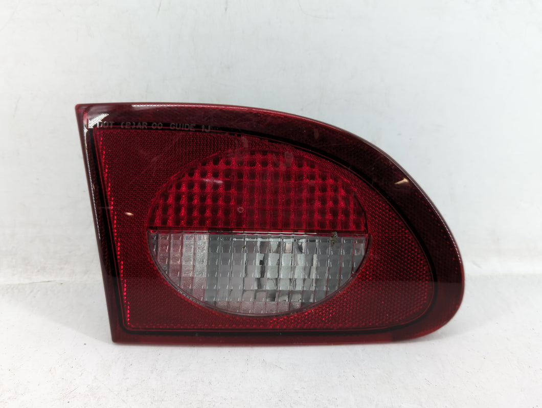 2000-2002 Chevrolet Cavalier Tail Light Assembly Driver Left OEM P/N:16519348 Fits 2000 2001 2002 OEM Used Auto Parts