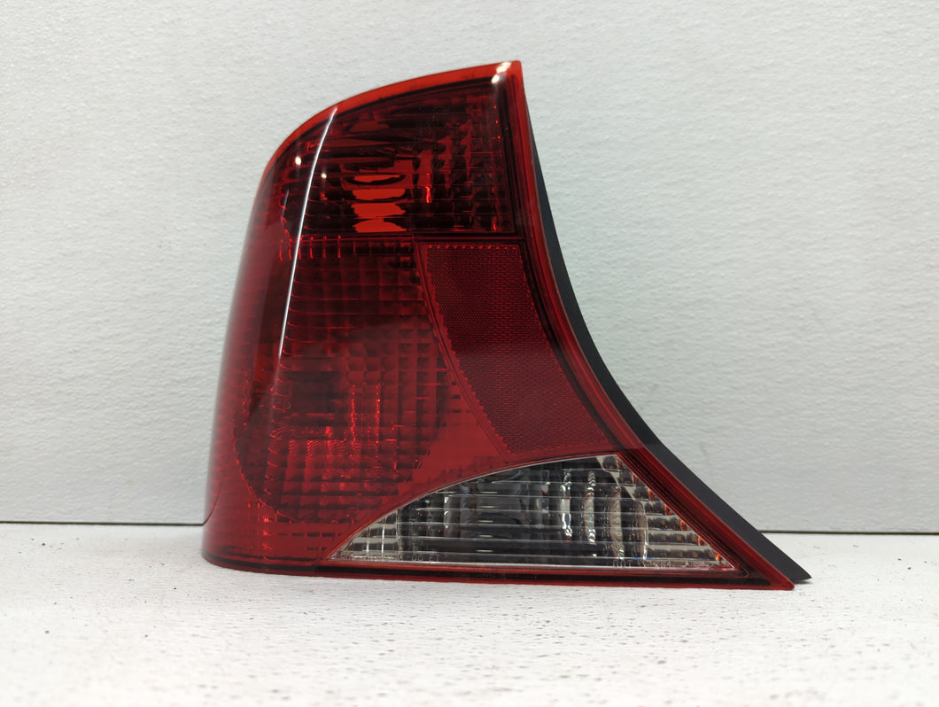 2002-2004 Ford Focus Tail Light Assembly Driver Left OEM P/N:YS4X-13441-CA Fits 2002 2003 2004 OEM Used Auto Parts