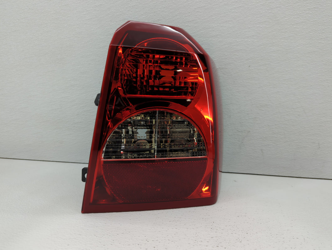 2008-2012 Dodge Caliber Tail Light Assembly Passenger Right OEM P/N:05303752AH 05303880AH Fits 2008 2009 2010 2011 2012 OEM Used Auto Parts