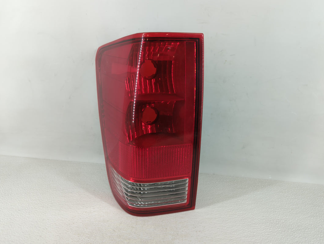 2004-2015 Nissan Titan Tail Light Assembly Passenger Right OEM P/N:26555 7S206 Fits OEM Used Auto Parts