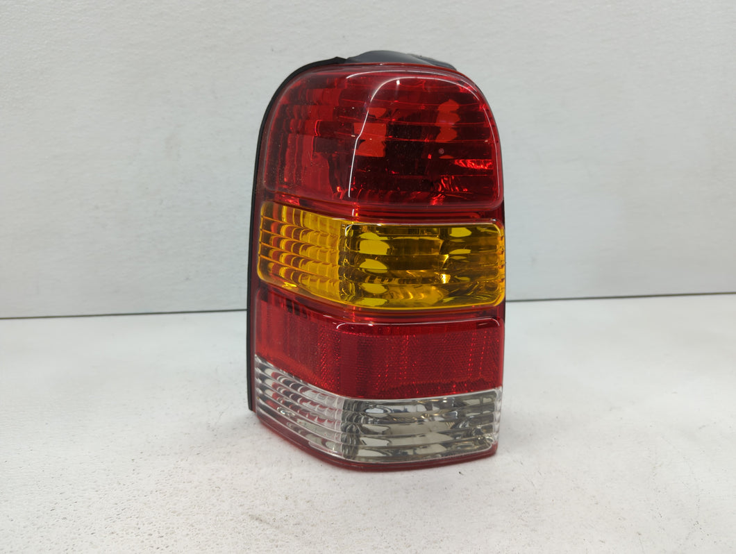 2001-2007 Ford Escape Tail Light Assembly Driver Left OEM P/N:4L84-13B505-D 1L84-13B505-D Fits 2001 2002 2003 2004 2005 2006 2007 OEM Used Auto Parts