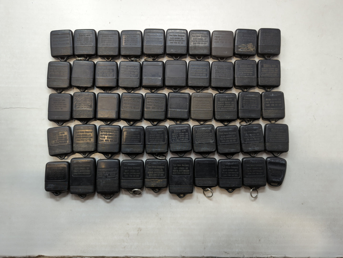 Lot of 50 Ford Keyless Entry Remote Fob MIXED FCC IDS MIXED PART NUMBERS - Oemusedautoparts1.com