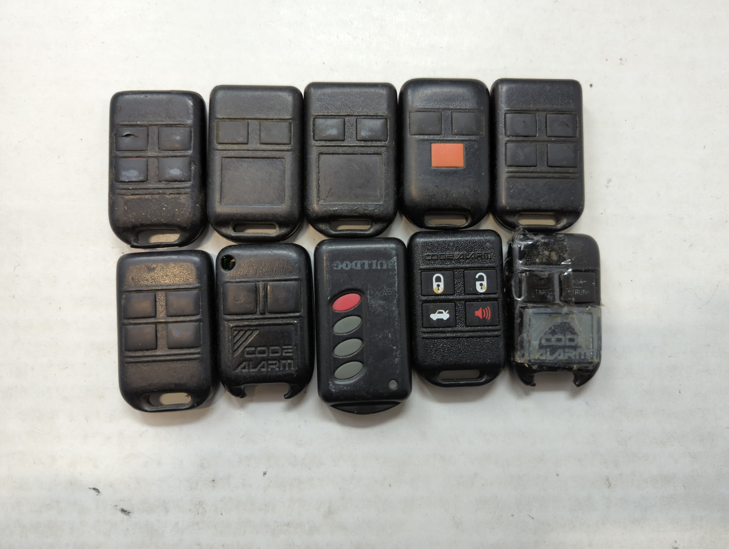 Lot of 10 Aftermarket Keyless Entry Remote Fob MIXED FCC IDS MIXED PART - Oemusedautoparts1.com