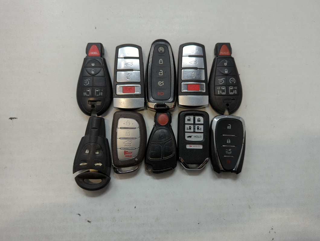 Lot of 10 Aftermarket Keyless Entry Remote Fob MIXED FCC IDS MIXED PART