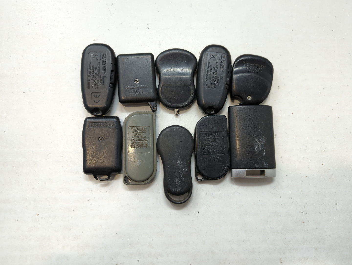 Lot of 10 Aftermarket Keyless Entry Remote Fob MIXED FCC IDS MIXED PART - Oemusedautoparts1.com