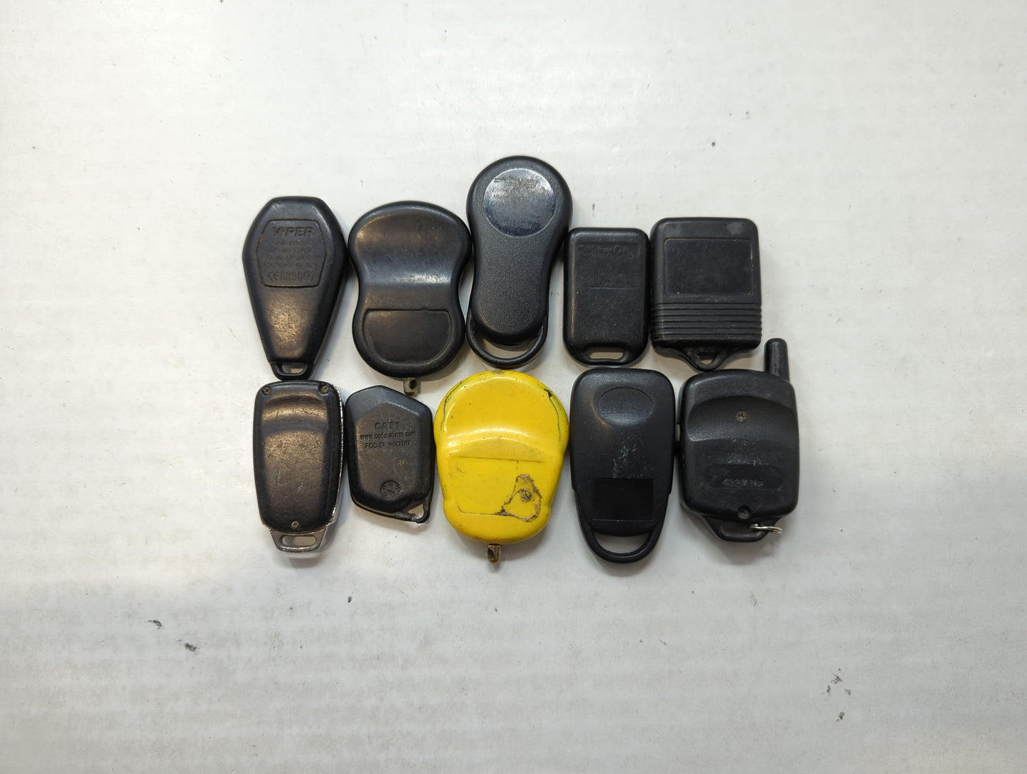 Lot of 10 Aftermarket Keyless Entry Remote Fob MIXED FCC IDS MIXED PART - Oemusedautoparts1.com