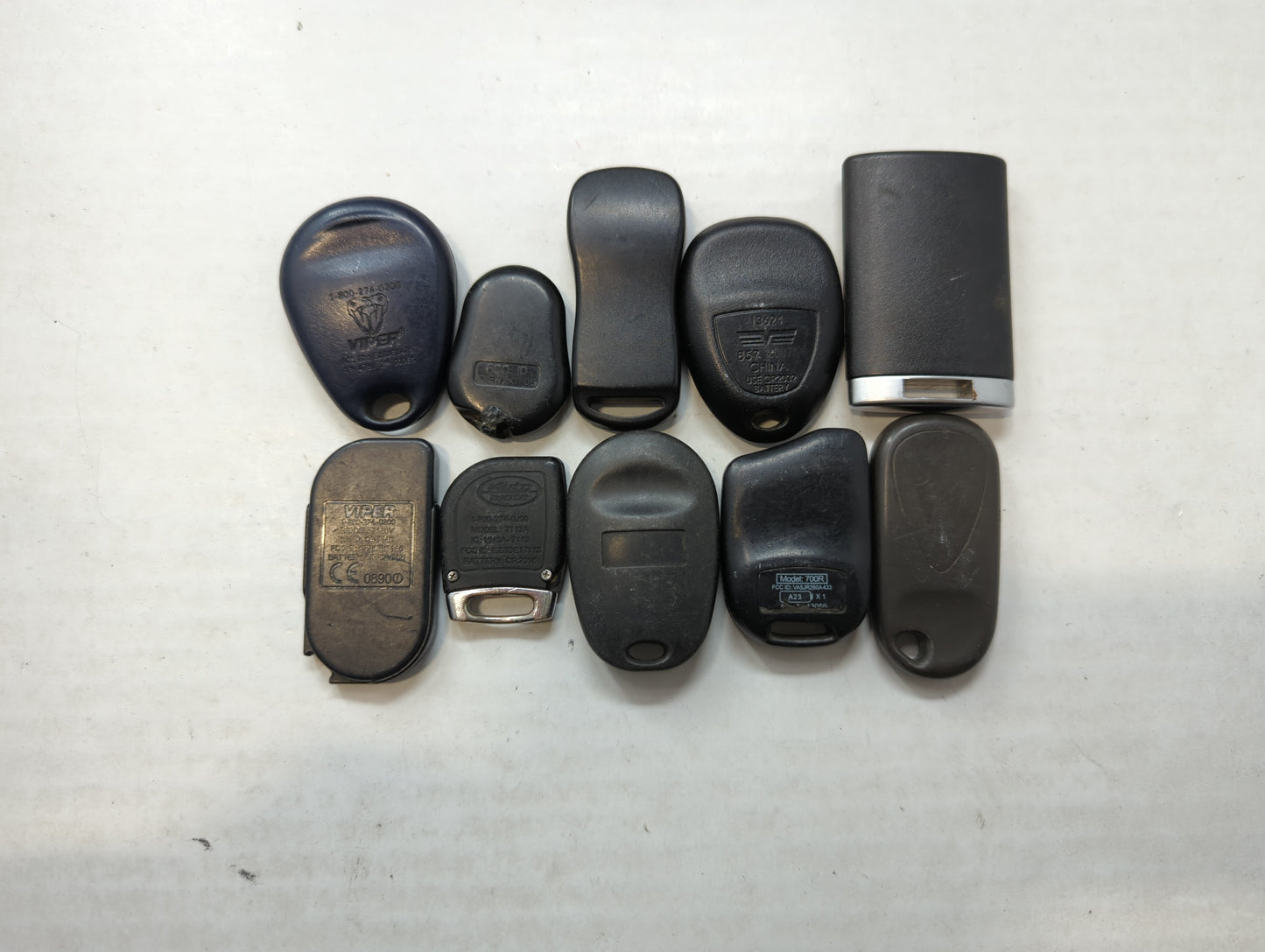 Lot of 10 Aftermarket Keyless Entry Remote Fob MIXED FCC IDS MIXED PART - Oemusedautoparts1.com