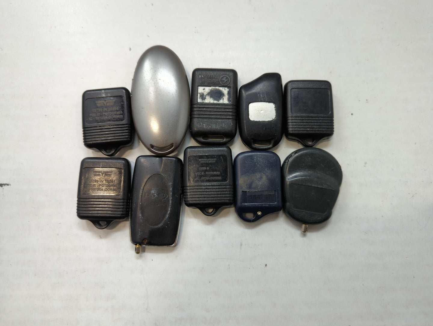 Lot of 10 Aftermarket Keyless Entry Remote Fob MIXED FCC IDS MIXED PART - Oemusedautoparts1.com