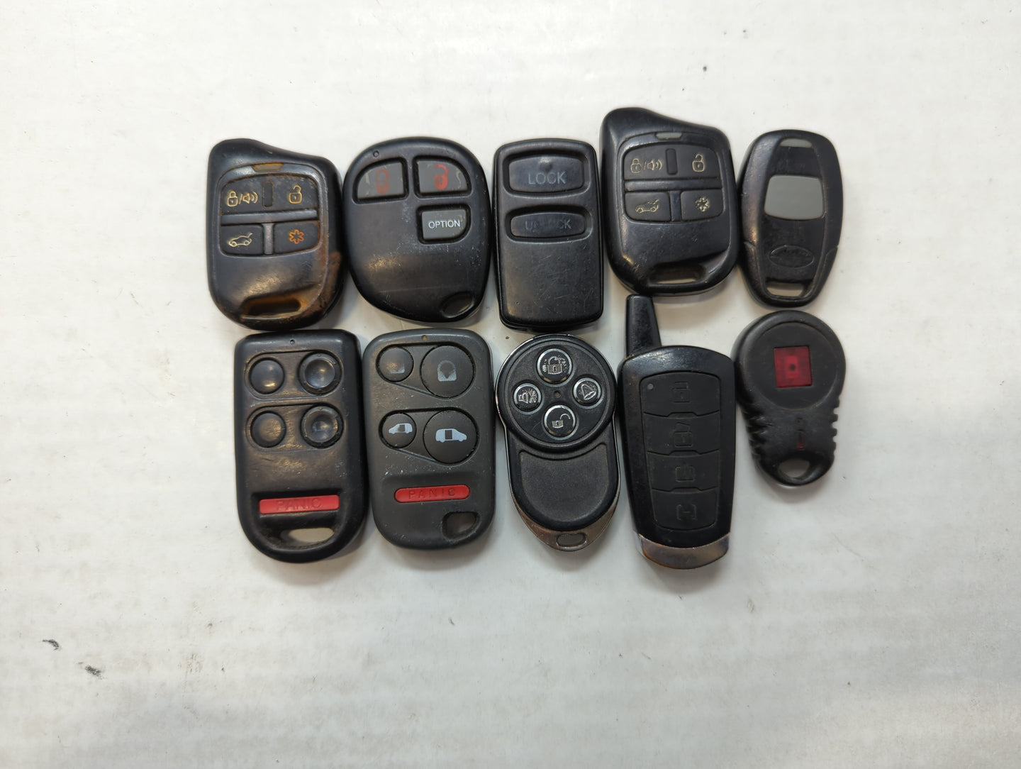 Lot of 10 Aftermarket Keyless Entry Remote Fob MIXED FCC IDS MIXED PART - Oemusedautoparts1.com