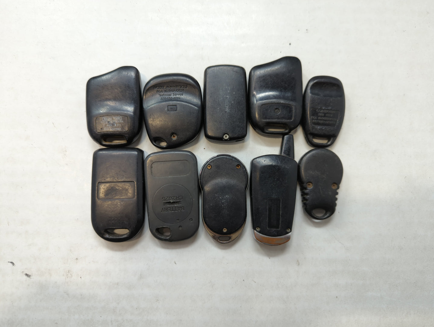 Lot of 10 Aftermarket Keyless Entry Remote Fob MIXED FCC IDS MIXED PART - Oemusedautoparts1.com