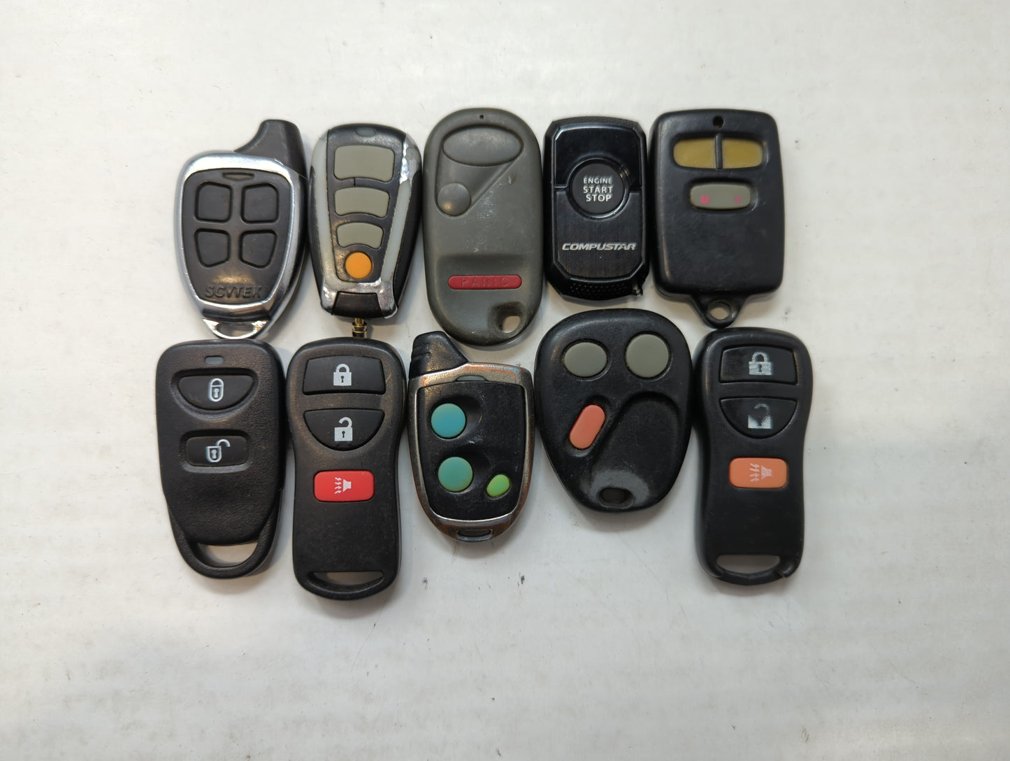 Lot of 10 Aftermarket Keyless Entry Remote Fob MIXED FCC IDS MIXED PART - Oemusedautoparts1.com