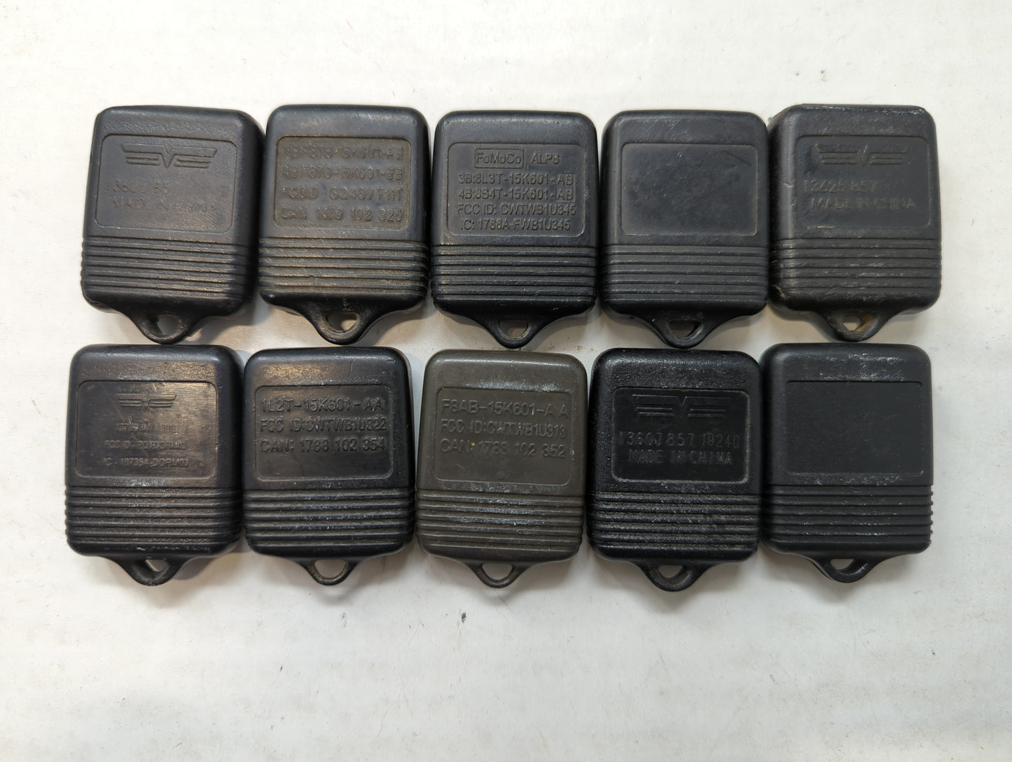 Lot of 10 Aftermarket Ford Keyless Entry Remote Fob MIXED FCC IDS MIXED - Oemusedautoparts1.com
